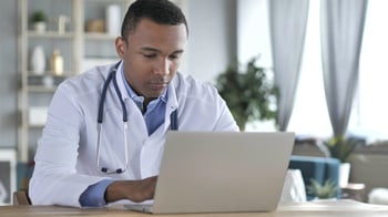 doctor on laptop
