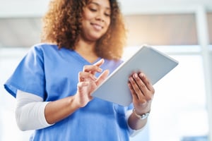 nurse on tablet