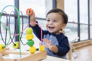 toddler-playing-with-toy-waiting-room